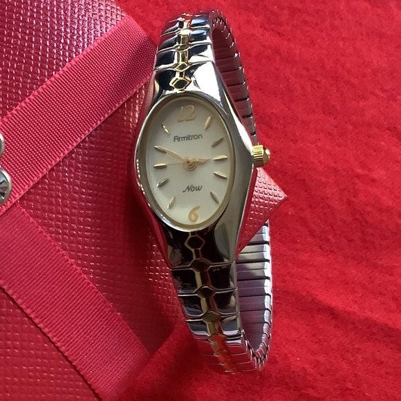 Armitron Woman’s Stretch Silver & Gold Tone Watch - Picture 5 of 6